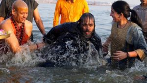 Reliance Chairman Mukesh Ambani Takes Holy Dip at Maha Kumbh 2025